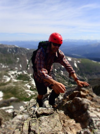 Jonno climbs along the ridgeline